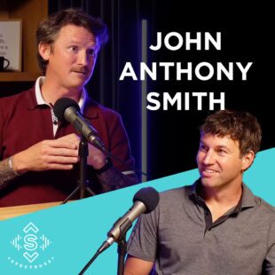 Podcast thumbnail for a Spectruss Speakeasy episode featuring John Anthony Smith, showing two guests speaking into microphones during a studio conversation.