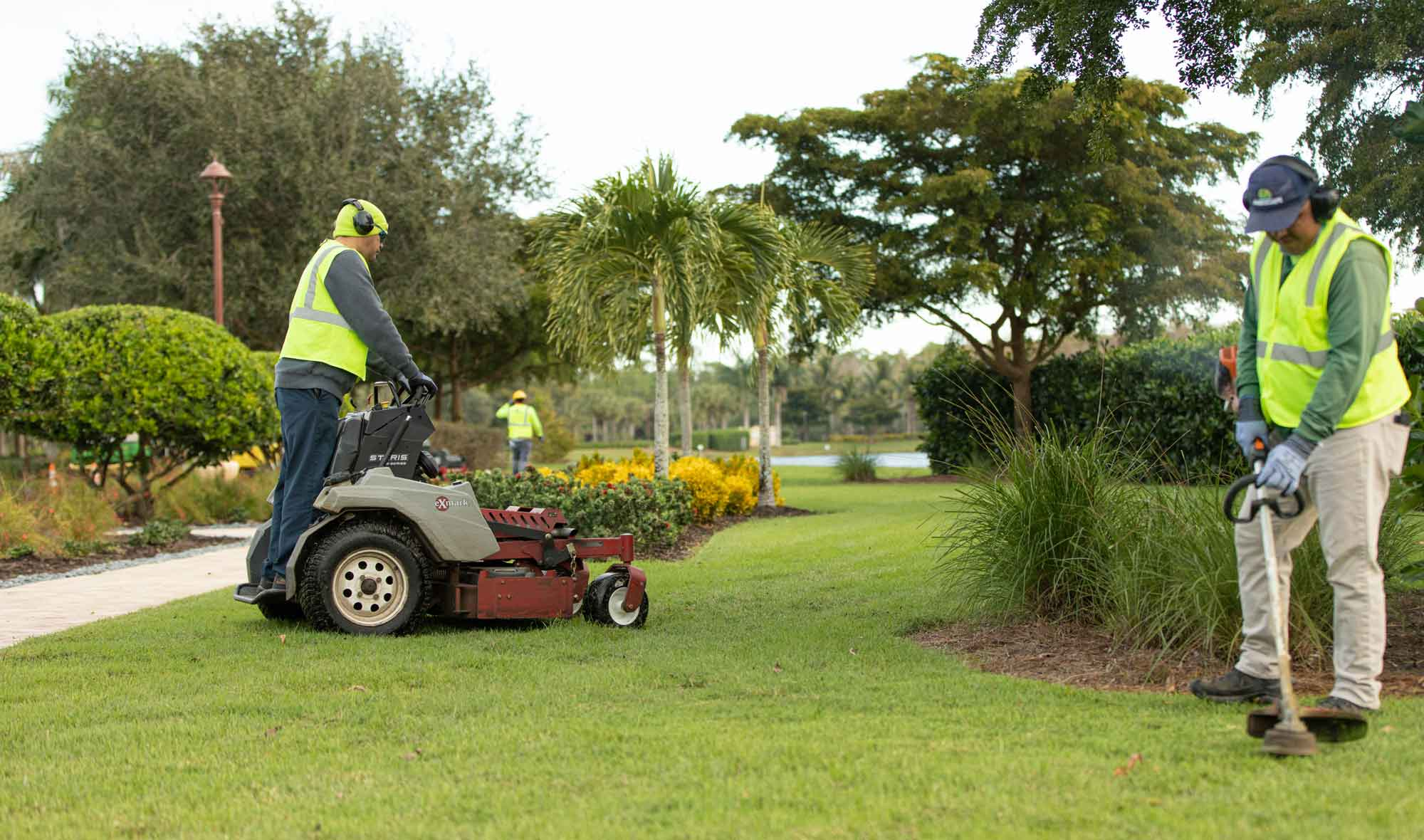 Professional Landscaping Companies maintaining residential lawns with precision equipment and expert care.