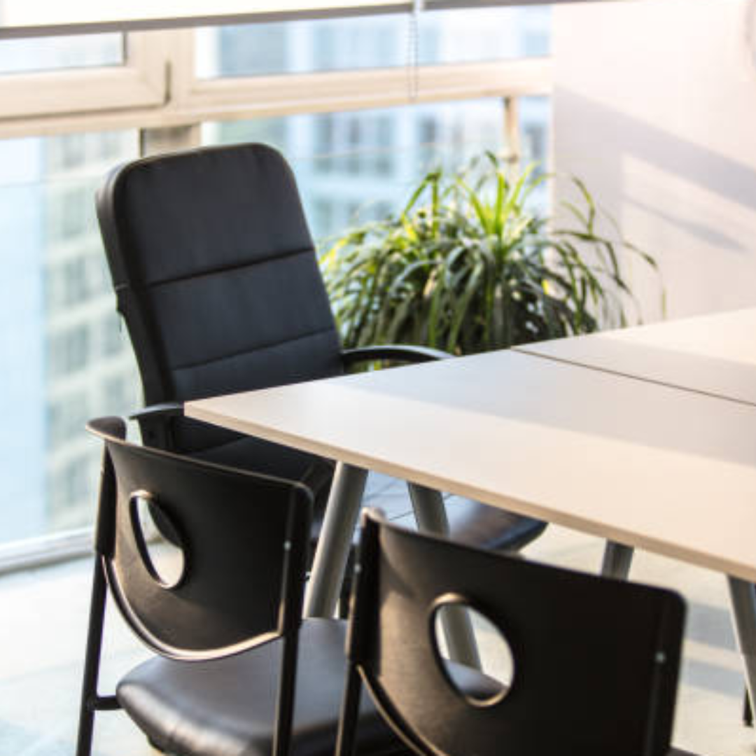 Empty executive office chair representing Fractional CMO service leadership for growing service businesses