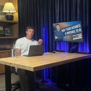 Spectruss CEO Sam Silvey discussing Generative Engine Optimization (GEO) at the AI Live event in Chattanooga, TN, explaining how to make businesses visible to AI search.