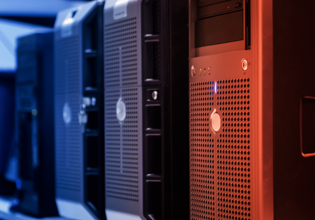 Server hardware inside a data center with blue and red lighting