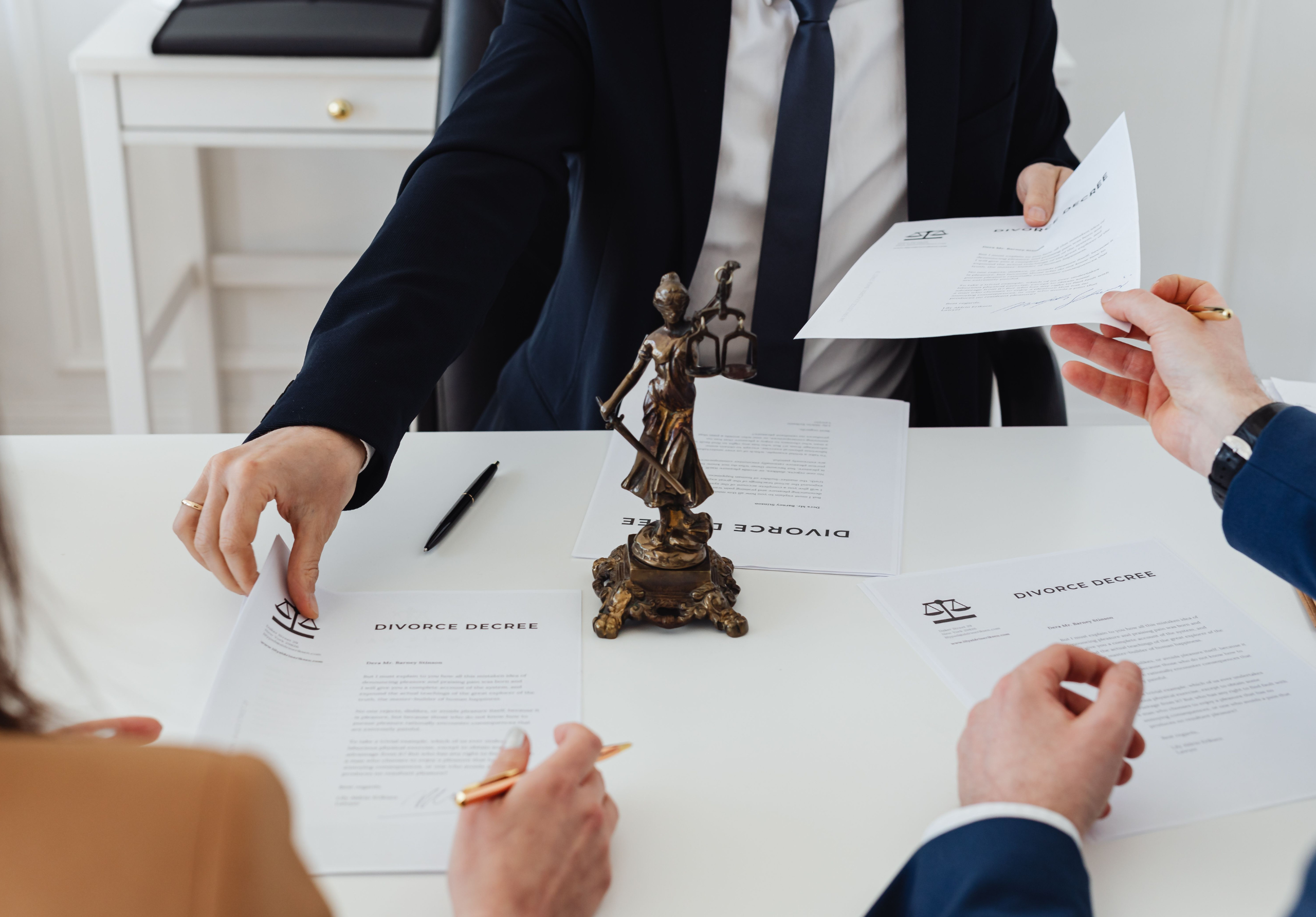 criminal defense attorney reviewing case documents with clients in Chattanooga, Tennessee.